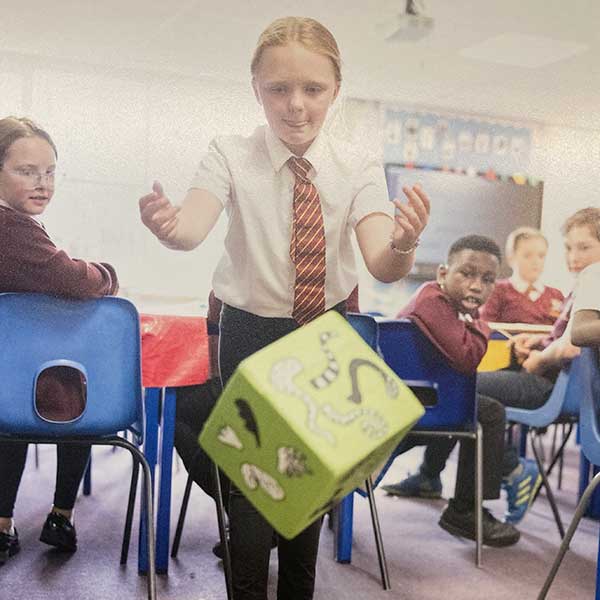 Amanda Rigby workshop leader facilitator learning to draw emotional monsters with primary school children