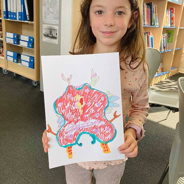 Amanda Rigby workshop leader facilitator learning to draw emotional monsters with primary school children